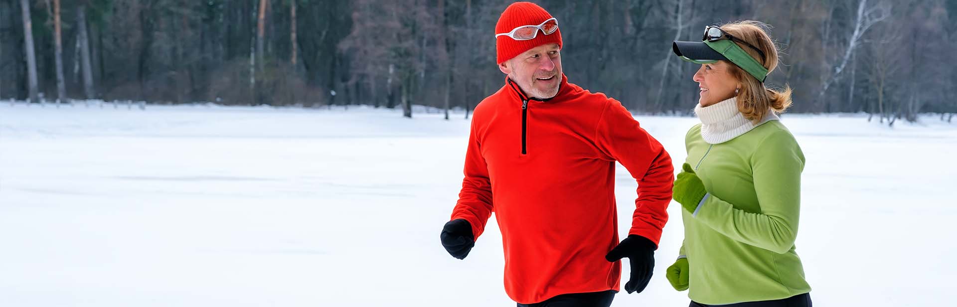 couple jogging in snow