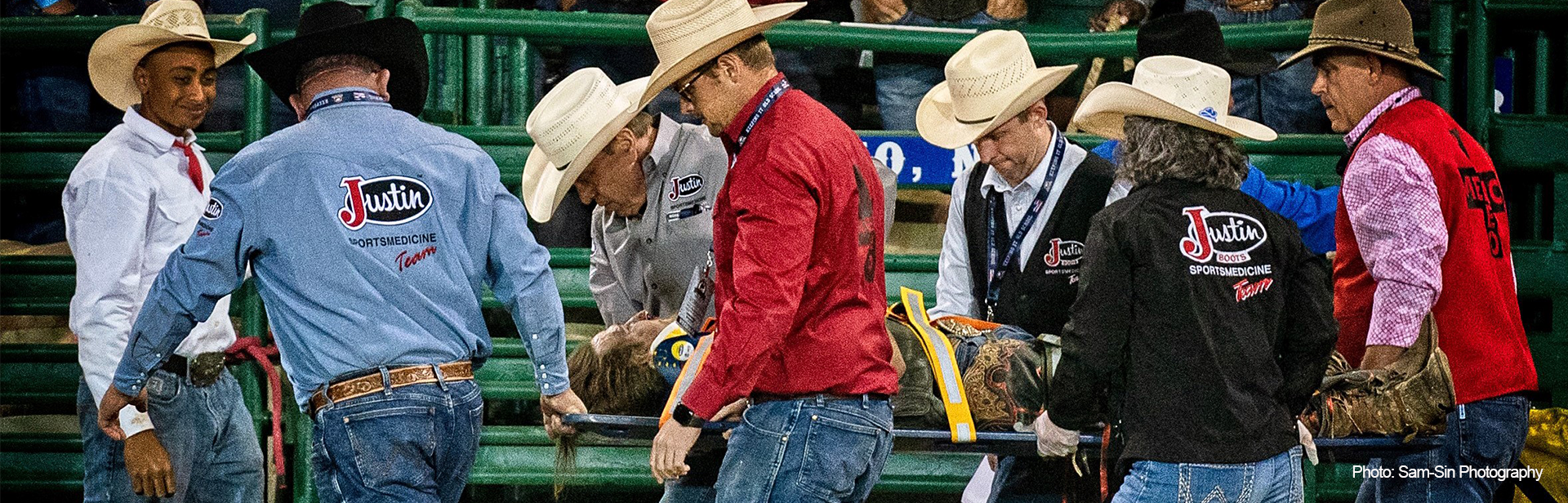Dr Travis Kieckbusch and Justin Sports Medicine Team tending to rodeo participant