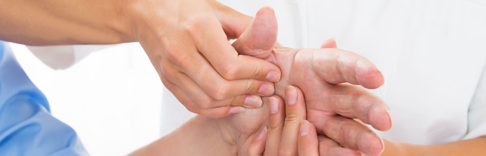 Hand being examined by physician