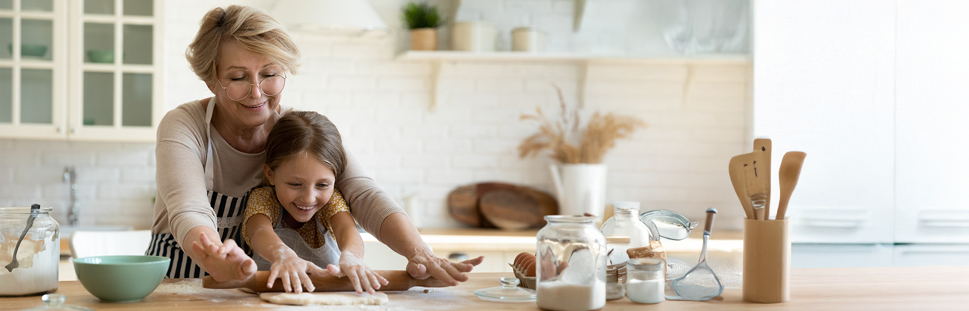 grandmother and grandaughter cooking together