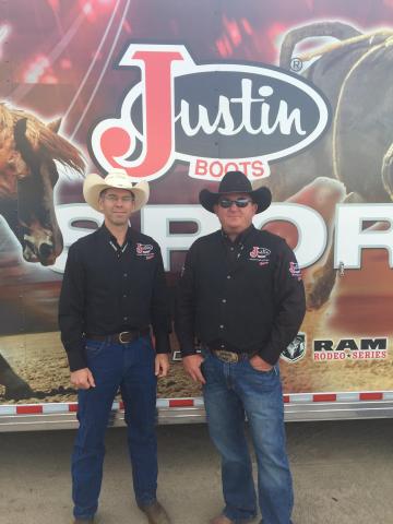 Dr. Dolan and Dr. Kieckbusch standing in front of Justin Sports Medicine Team truck.