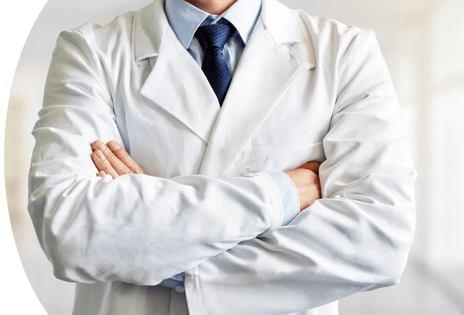 Close up photo of a doctor with arms crossed