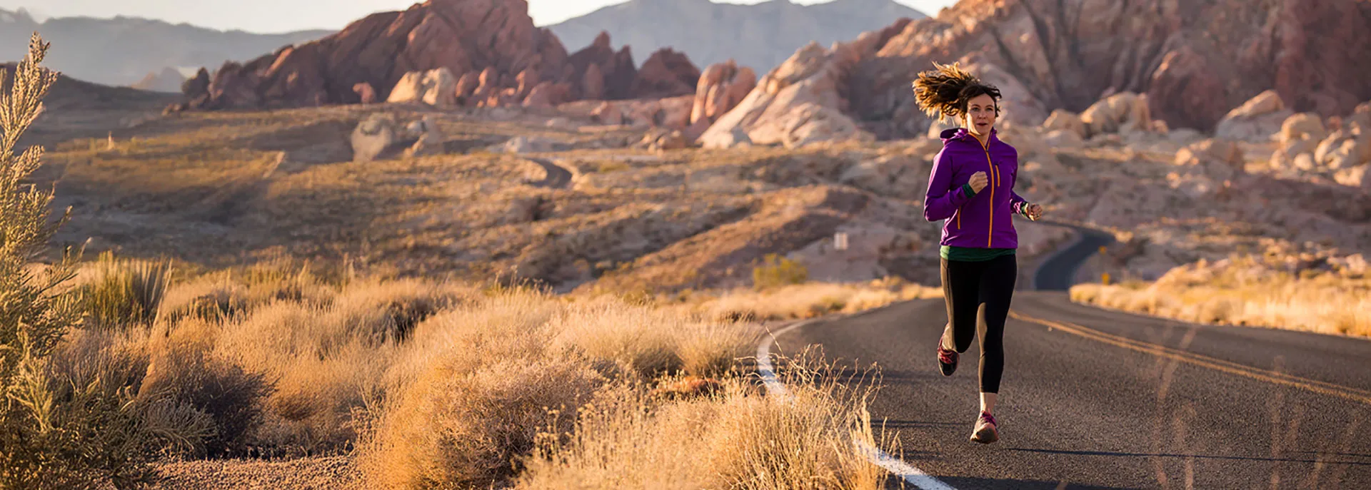 young woman running outdoors