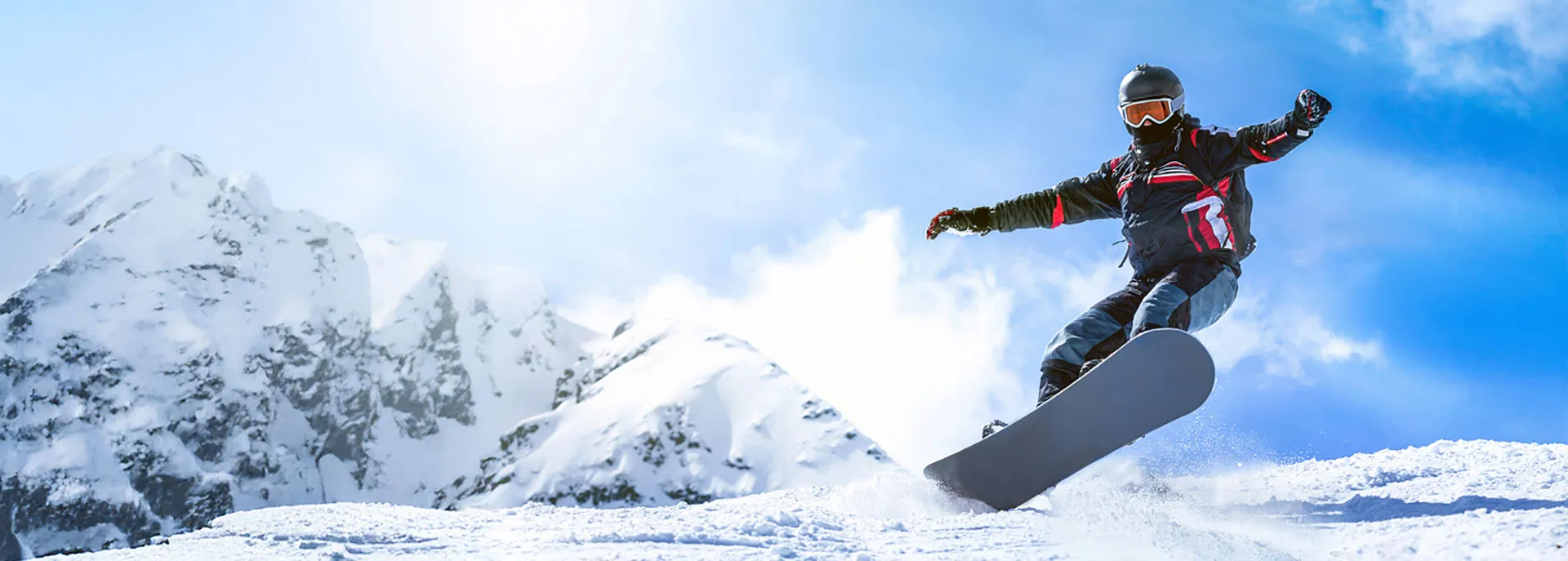 man snowboarding in mid-air